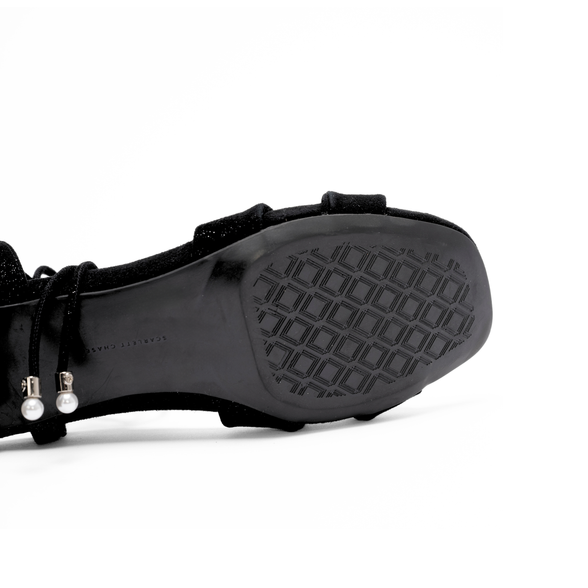 Scarlett Chase noir metallic velvet upper Cali 45 dress sandal with wrap-around ties and a gathered front | Outsole view on white background
