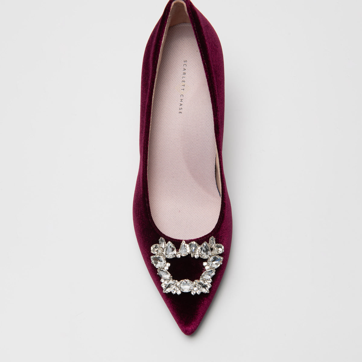 Scarlett Chase Seine 75 Pump in Ruby Velvet with SC toe broach accessory | Overhead view on white background