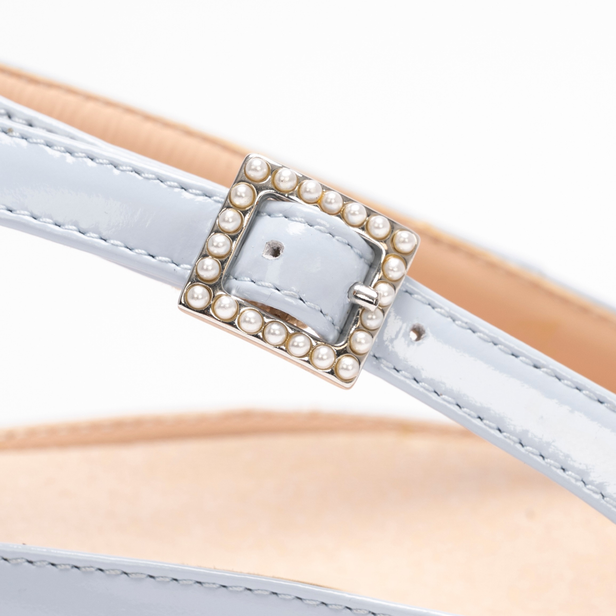 Scarlett Chase White Roma 55 Slingback with a stable, sculpted heel and an adjustable backstrap buckle | Detail shot on white background