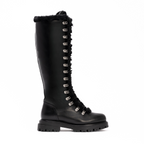Scarlett Chase Aspen Knee-High Winter Shearling Boot in Black Leather with silver nickel eyelets and a black lace | shown in side view on white background
