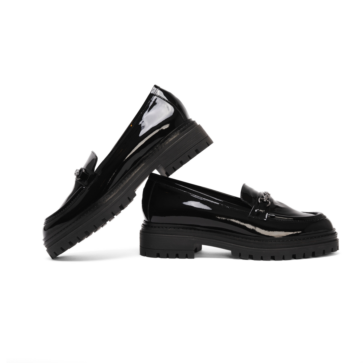 Scarlett Chase Arden Lug Loafer in Black Patent with a lightweight sole and SC accessory | Side view of both shoes on a white background