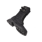 Scarlett Chase Athena Combat Boot with a lightweight sole, functioning hardware, and a hidden zipper | Black Nylon boot show in side view, laying flat on white background