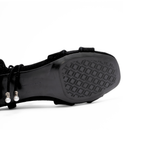 Scarlett Chase noir metallic velvet upper Cali 45 dress sandal with wrap-around ties and a gathered front | Outsole view on white background