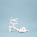 Scarlett Chase Cali 45 white satin dress sandal with wrap-around ties and a gathered front | Profile on blue background