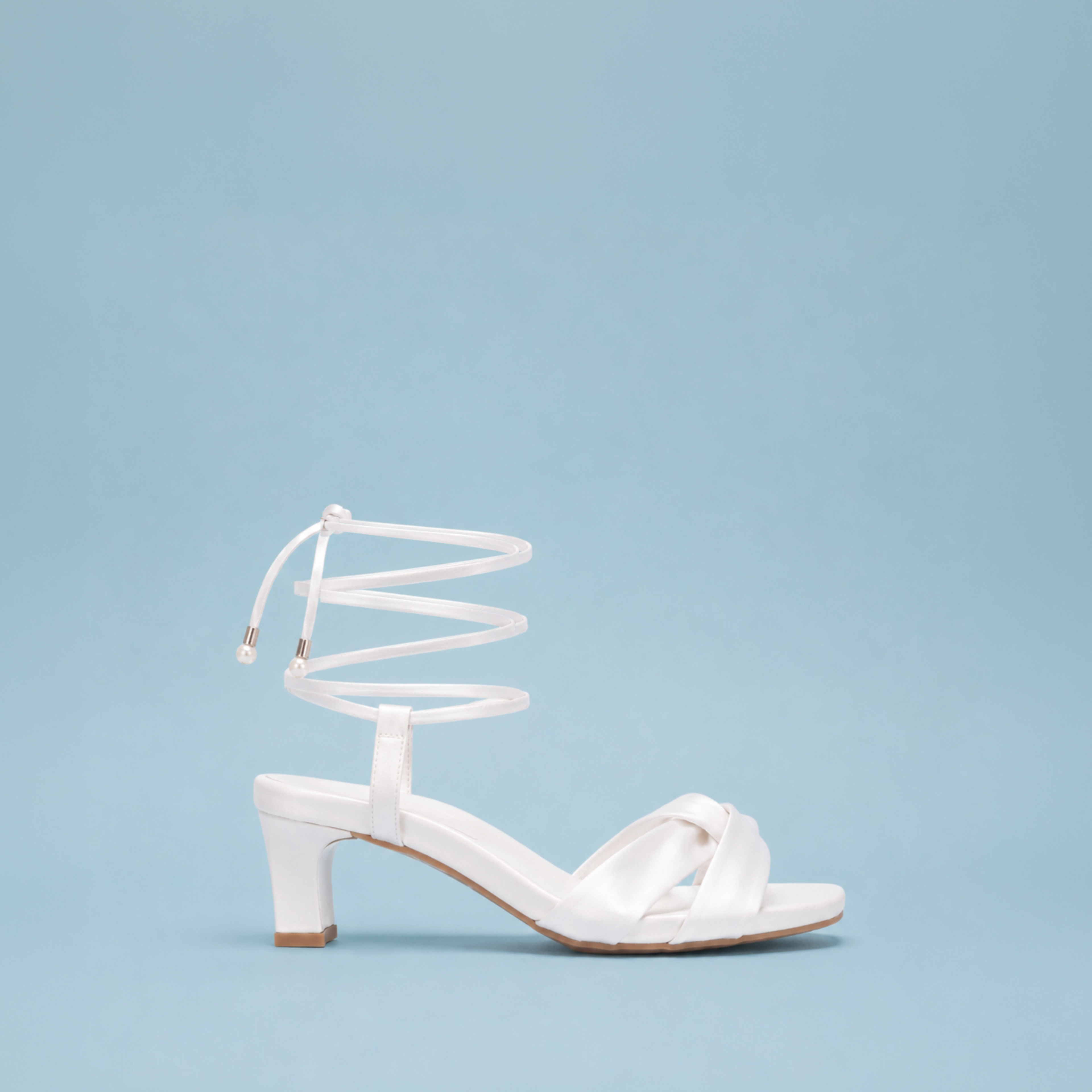 Scarlett Chase Cali 45 white satin dress sandal with wrap-around ties and a gathered front | Profile on blue background