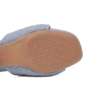 Scarlett Chase Chloe denim linen 45 block heel sandal with a mesh-lined quilted upper and SC accessory | Outsole view on white background