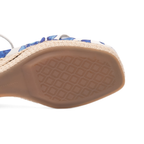 Scarlett Chase bluebell printed satin Corsica Wedge Sandal with an adjustable back strap and handroped wedge bottom | Outsole on white background
