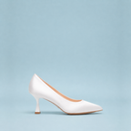Scarlett Chase Sarah 75 Bridal Pump in white satin with a rounded upper and sculpted heel | Profile on sky blue background