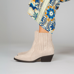 Scarlett Chase Beige ankle Frida Cowboy Boot with gore stretch | On feet on grey background