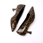 Scarlett Chase Cheetah patent leather Gala 55 Pump with a rounded upper and sculpted heel | One shoe lying on left side other shoe lying on right side toe to heel on white background