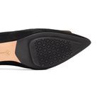 Scarlett Chase noir suede Reese 55 Slingback with a sculpted heel, an adjustable backstrap buckle, and a taupe toe accessory | Outsole on white background