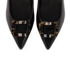 Scarlett Chase Row 75 Slingback Black Patent Leather with a sculpted heel and resin tortoise rectangular accessory | Overhead 3/4 view on white background