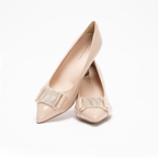 Scarlett Chase Nude Patent Napa leather Sofia 75 Pump with a Nude Patent resin accessory | Profile on white background