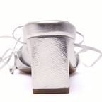 Scarlett Chase champagne metallic nap leather Cali 45 dress sandal with wrap-around ties and a gathered front | detail of back heel from the back on white background