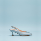 Roma 55 Scarlett Chase sky blue Roma 55 Slingback with a stable, sculpted heel and an adjustable backstrap buckle | Profile on sky blue background 