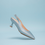 Roma 55 Scarlett Chase sky blue Roma 55 Slingback with a stable, sculpted heel and an adjustable backstrap buckle | Profile on sky blue background 