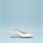 Roma 55 Scarlett Chase white Roma 55 Slingback with a stable, sculpted heel and an adjustable backstrap buckle | Profile on sky blue background 