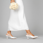 Scarlett Chase White Rory 75 Slingback with a stable, sculpted heel and an adjustable backstrap buckle | lifestyle shot on grey background