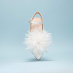 Scarlett Chase Rose 55 Pump with a rounded upper, sculpted heel, and adjustable back strap with pearl buckle and floral accessory | overhead profile on light blue background