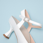 Scarlett Chase Rose 55 Pump with a rounded upper, sculpted heel, and adjustable back strap with pearl buckle | 3/4 Overhead Side View on light blue background