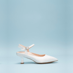 Scarlett Chase Rose 55 Pump with a rounded upper, sculpted heel, and adjustable back strap with pearl buckle | Profile on a light blue background