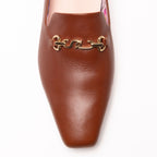 Scarlett Chase Weston Mule in Caramel Napa with floral lining and an SC gold accessory | Overhead 3/4 view on white background