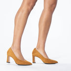 Scarlett Chase Scarlett 75 Pump Camel Suede with a V-cut upper and block heel | On foot standing on white background